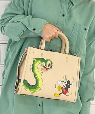 年末のプロモーション特価！ 新品新作 DISNEY X COACH ローグ 25